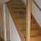 American ash closed staircase with glass balustrade